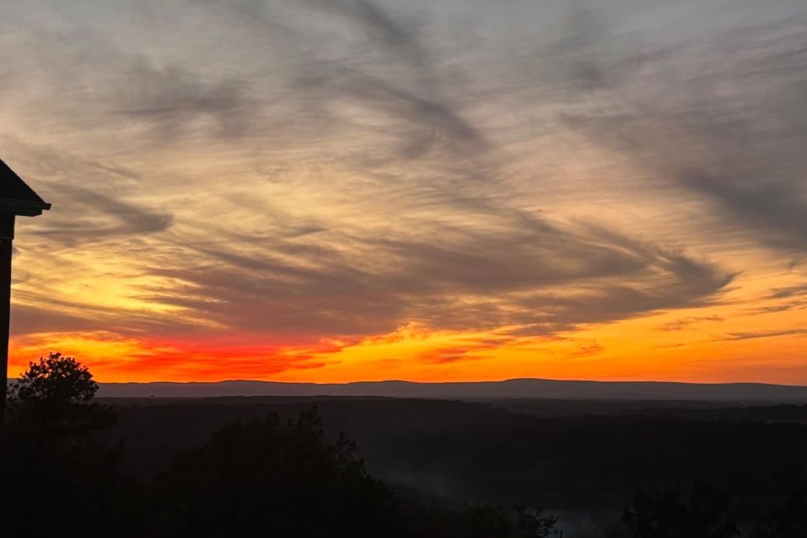 Sunset burning along the ridgeline over the Shenandoah River valley